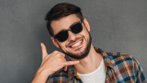 man doing call me gesture