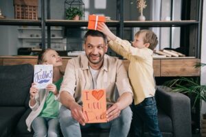 A dad having fun with his kids on Father